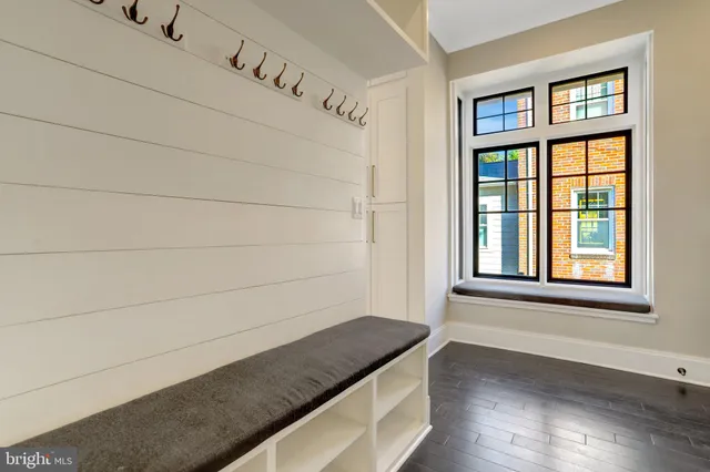 a bathroom with a toilet and shower