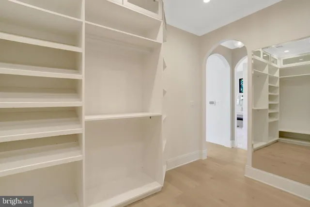 an empty room with a empty space and window