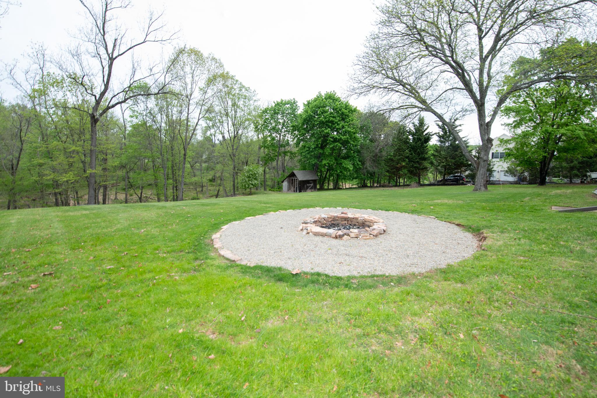 423 Brownsburg Road, Unit W Newtown, PA 18940 - Photo 38 of 109 Firepit and backyard