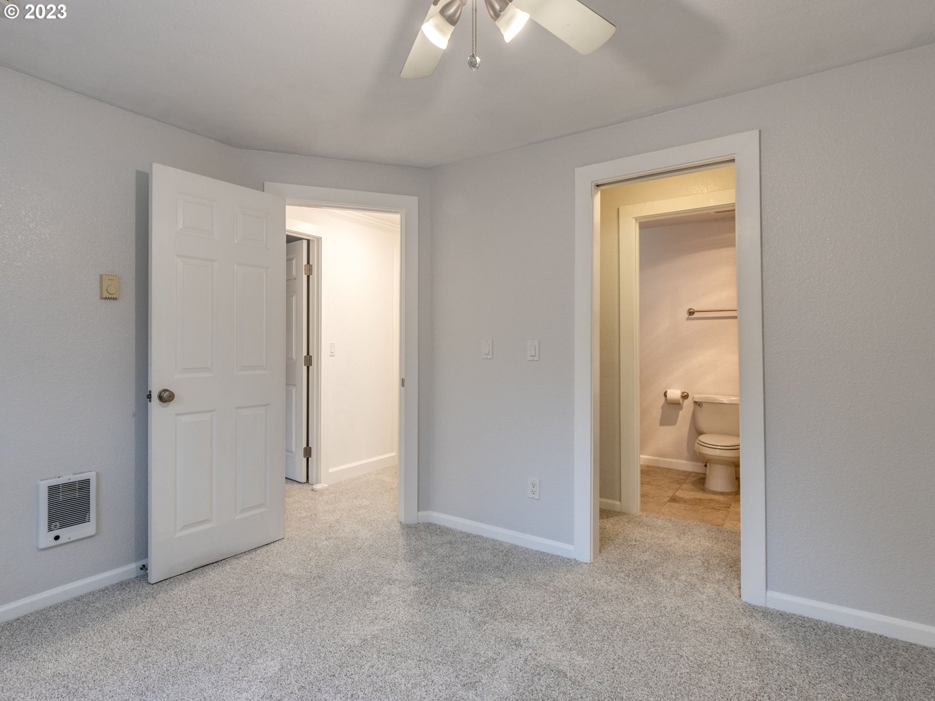 7937 Southwest 40th Avenue, Unit F Portland, OR 97219 - Photo 18 of 36 a view of room with windows and bathroom view