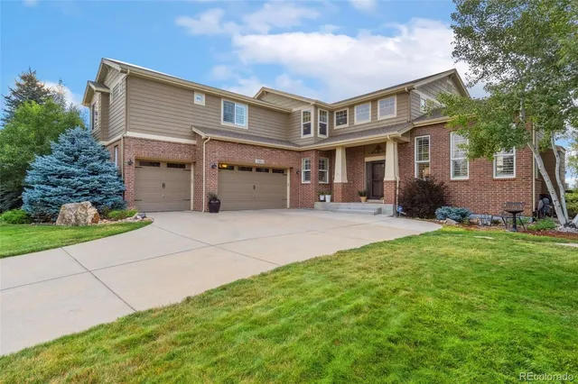 a house view with a garden space