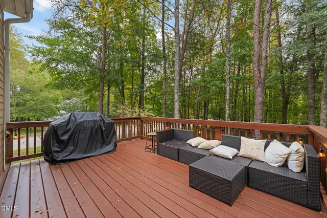 a backyard of a house with barbeque oven