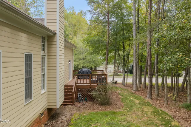 a view of a house with a back yard