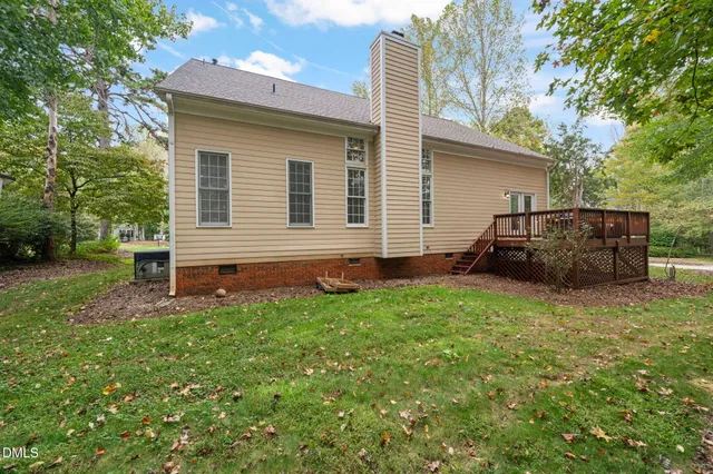 a view of a wooden deck with a bench