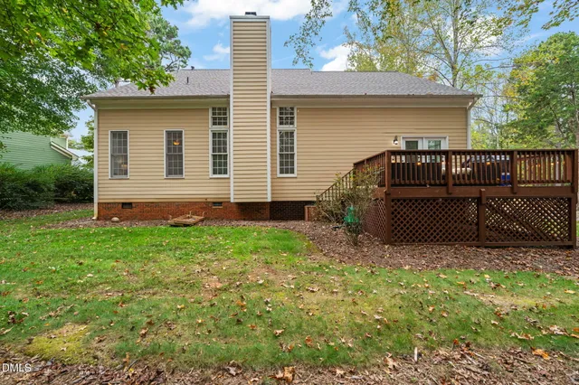 a view of backyard with a garden and entertaining space