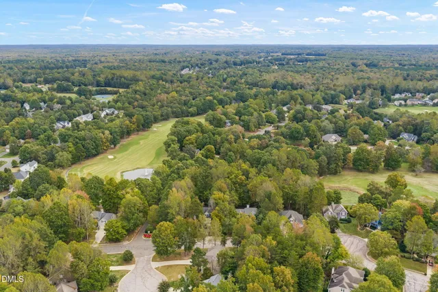a view of a fountain in the middle of a street