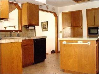 425 Sierra Vista Road Santa Rosa, CA 95401 - Photo 5 of 11 a kitchen with stainless steel appliances kitchen island granite countertop a sink and a cabinets
