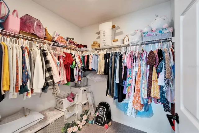 a big house with a big yard and large trees