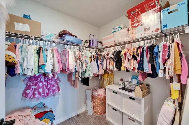 an aerial view of a house with swimming pool outdoor seating and yard