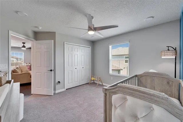 an aerial view of a house with a ocean view