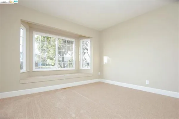 an empty room with a window