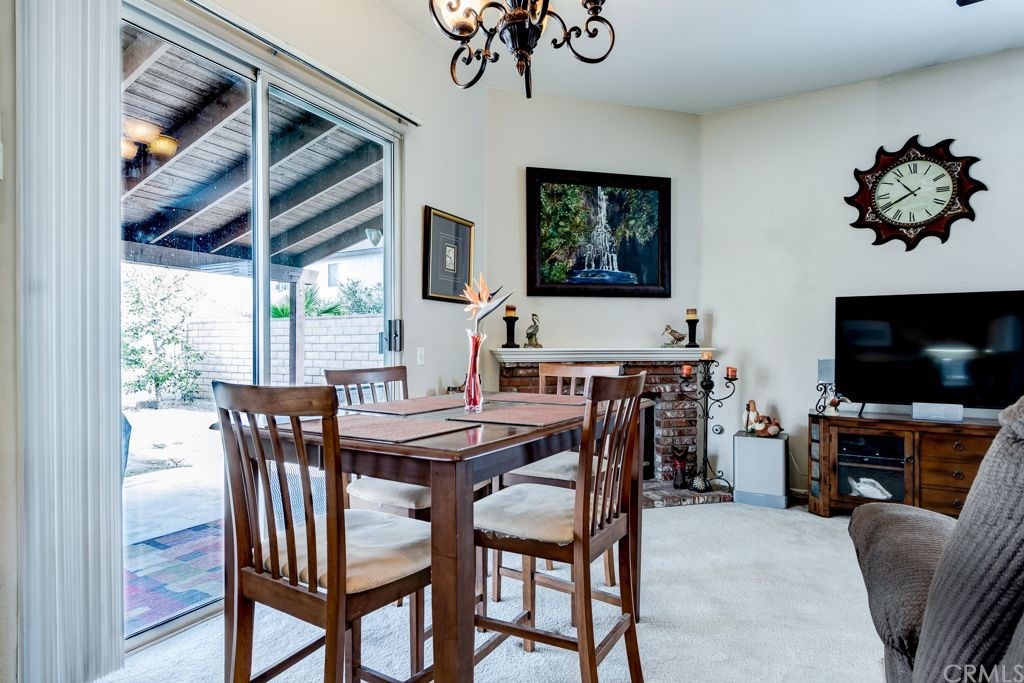 7858 Cameron Way Riverside, CA 92509 - Photo 10 of 40 Eating area is centrally located which makes it nice for family visiting or entertaining.