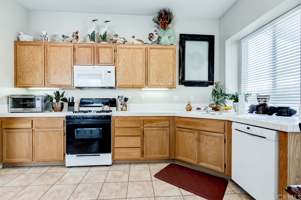 7858 Cameron Way Riverside, CA 92509 - Photo 11 of 40 The kitchen is large enough to accommodate a center island.