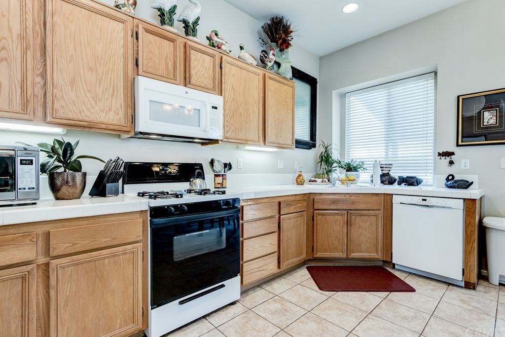 7858 Cameron Way Riverside, CA 92509 - Photo 12 of 40 There's plenty of counter space with this kitchen!