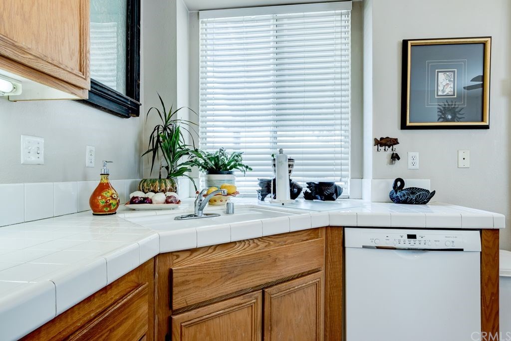 7858 Cameron Way Riverside, CA 92509 - Photo 13 of 40 The kitchen offers a nice sized window looking out into the backyard.