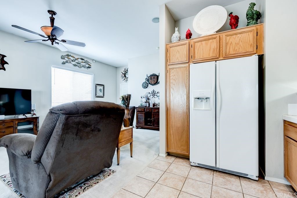 7858 Cameron Way Riverside, CA 92509 - Photo 15 of 40 Kitchen offers a pantry and plenty of cabinets!