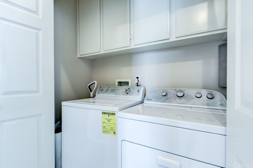 7858 Cameron Way Riverside, CA 92509 - Photo 17 of 40 Laundry closet has plenty of cabinets for storage!