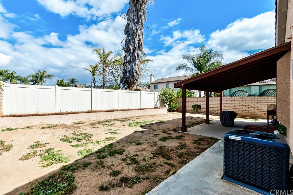 7858 Cameron Way Riverside, CA 92509 - Photo 30 of 40 Backyard offers sturdy block wall(s), beautiful vinyl fence, and nice retaining wall.