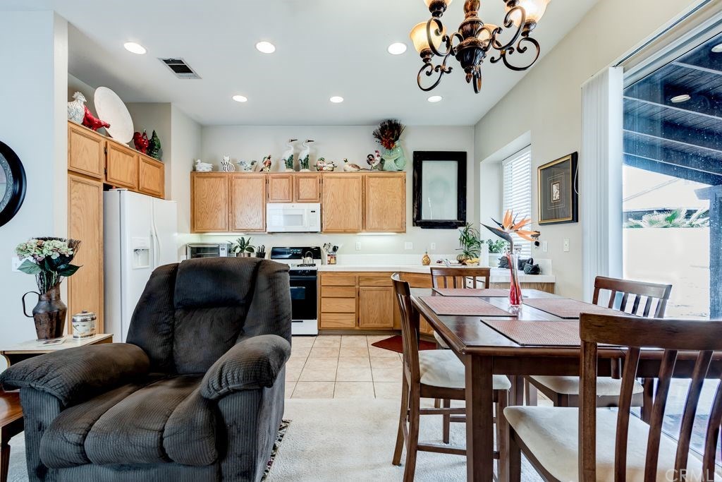7858 Cameron Way Riverside, CA 92509 - Photo 9 of 40 Eating area space oversees backyard which makes it nice and bright!