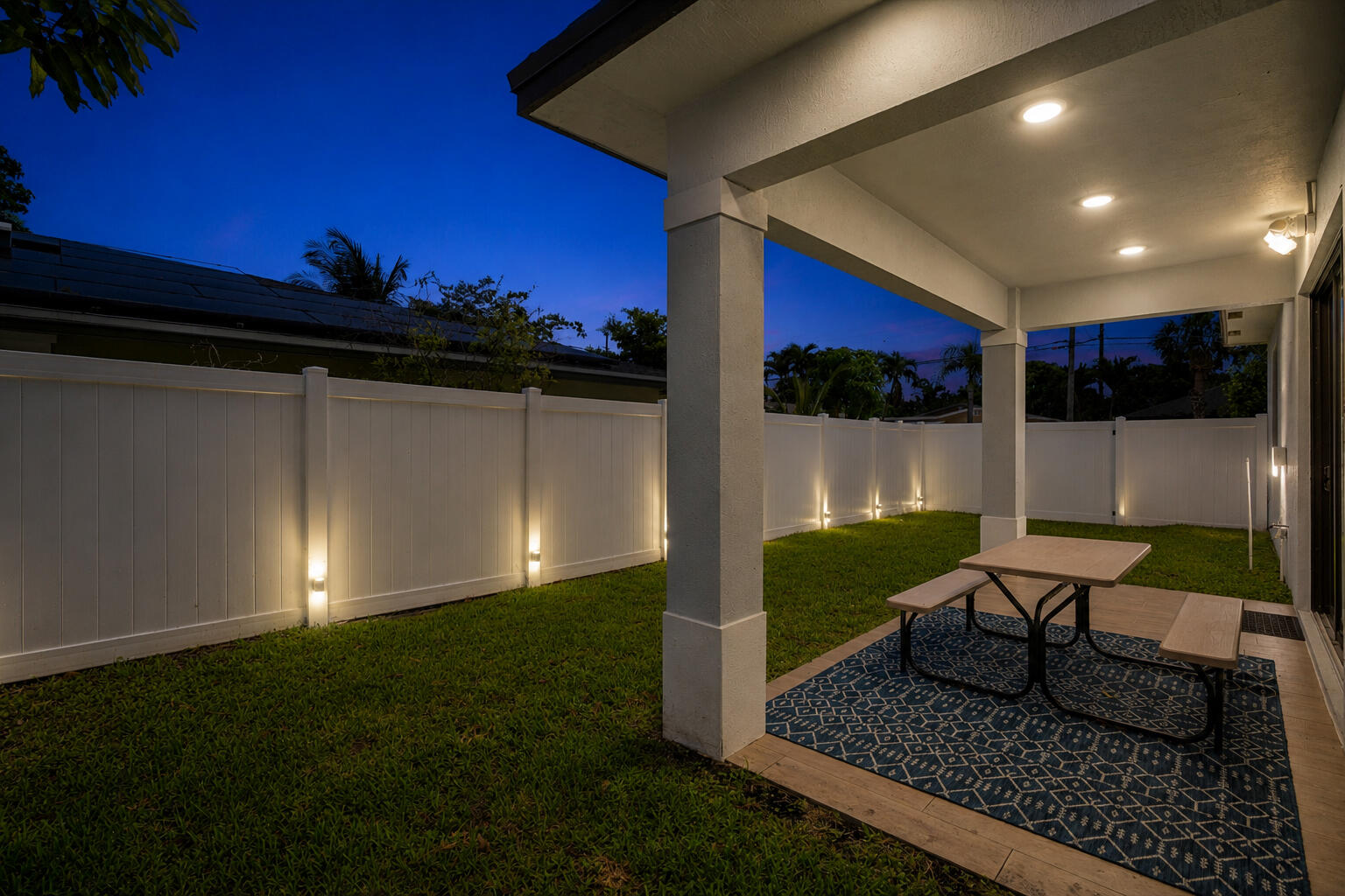 601 Southwest 3rd Street Delray Beach, FL 33444 - Photo 55 of 75 a view of a porch with furniture and a yard