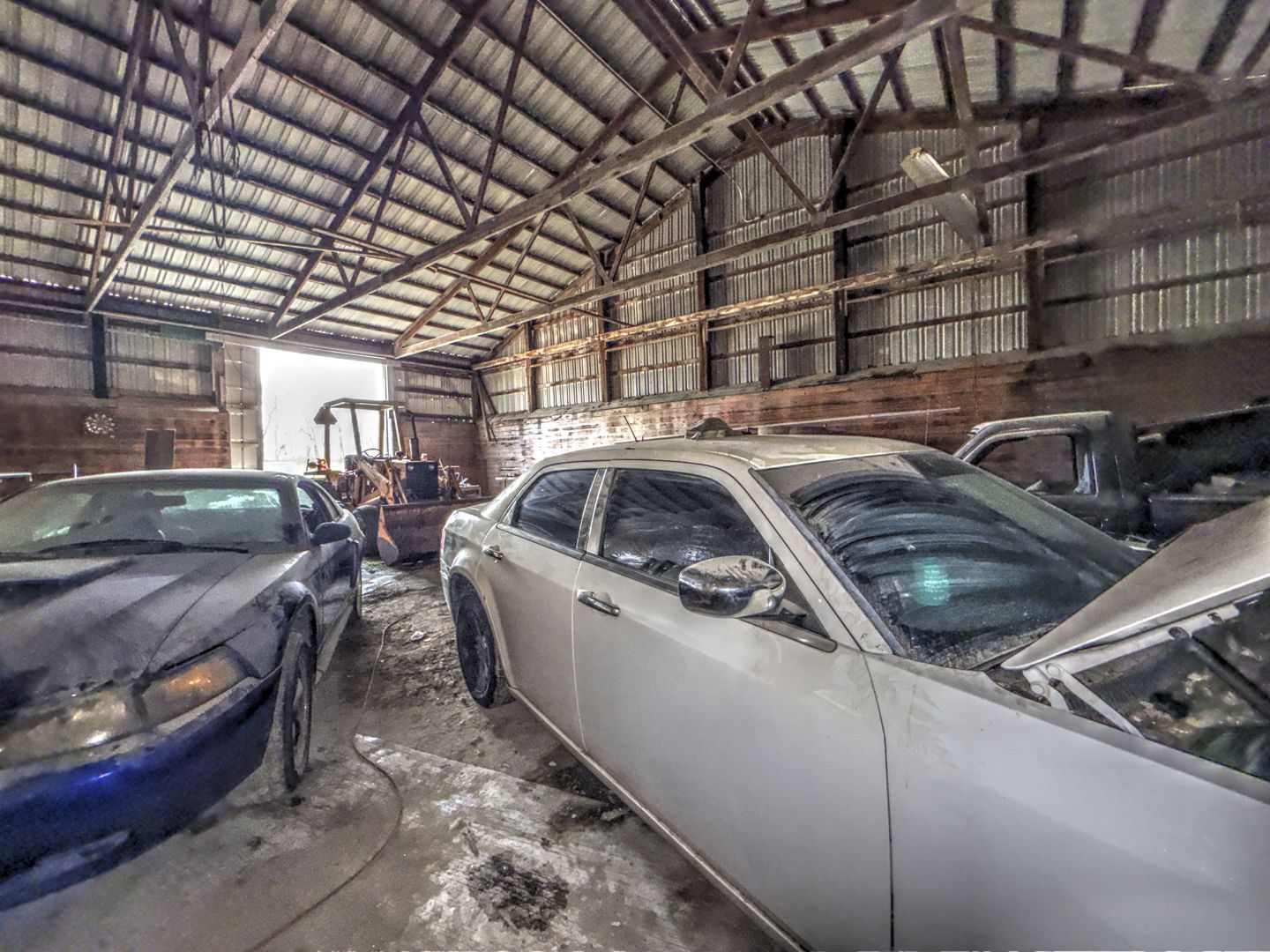 210 Hamilton Street Wellington, IL 60973 - Photo 21 of 21 a view of parking garage with cars parked