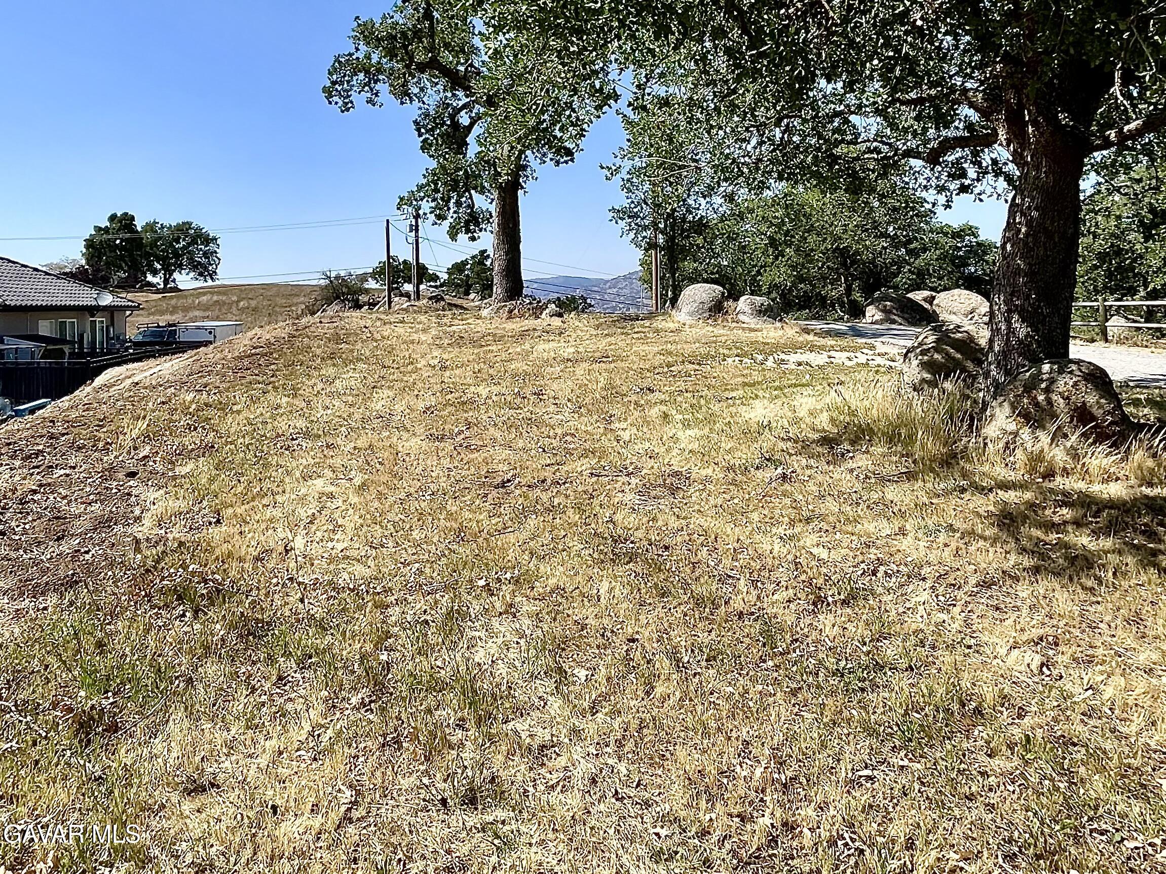 Horsethief Drive Tehachapi, CA 93561 - Photo 5 of 9 a view of a backyard of a house