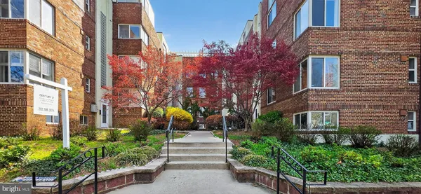 a view of a building with a garden