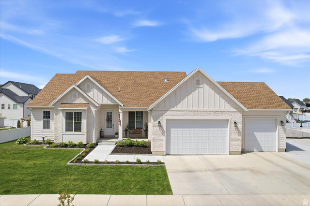 283 North 500 West Mapleton, UT 84664 - Photo 1 of 102 View of front of house with board and batten siding.