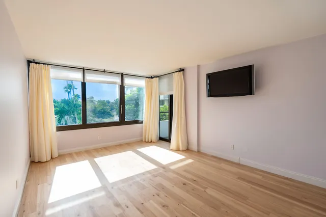 a view of a livingroom with a flat screen tv