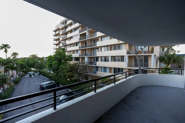 a view of a building from a balcony