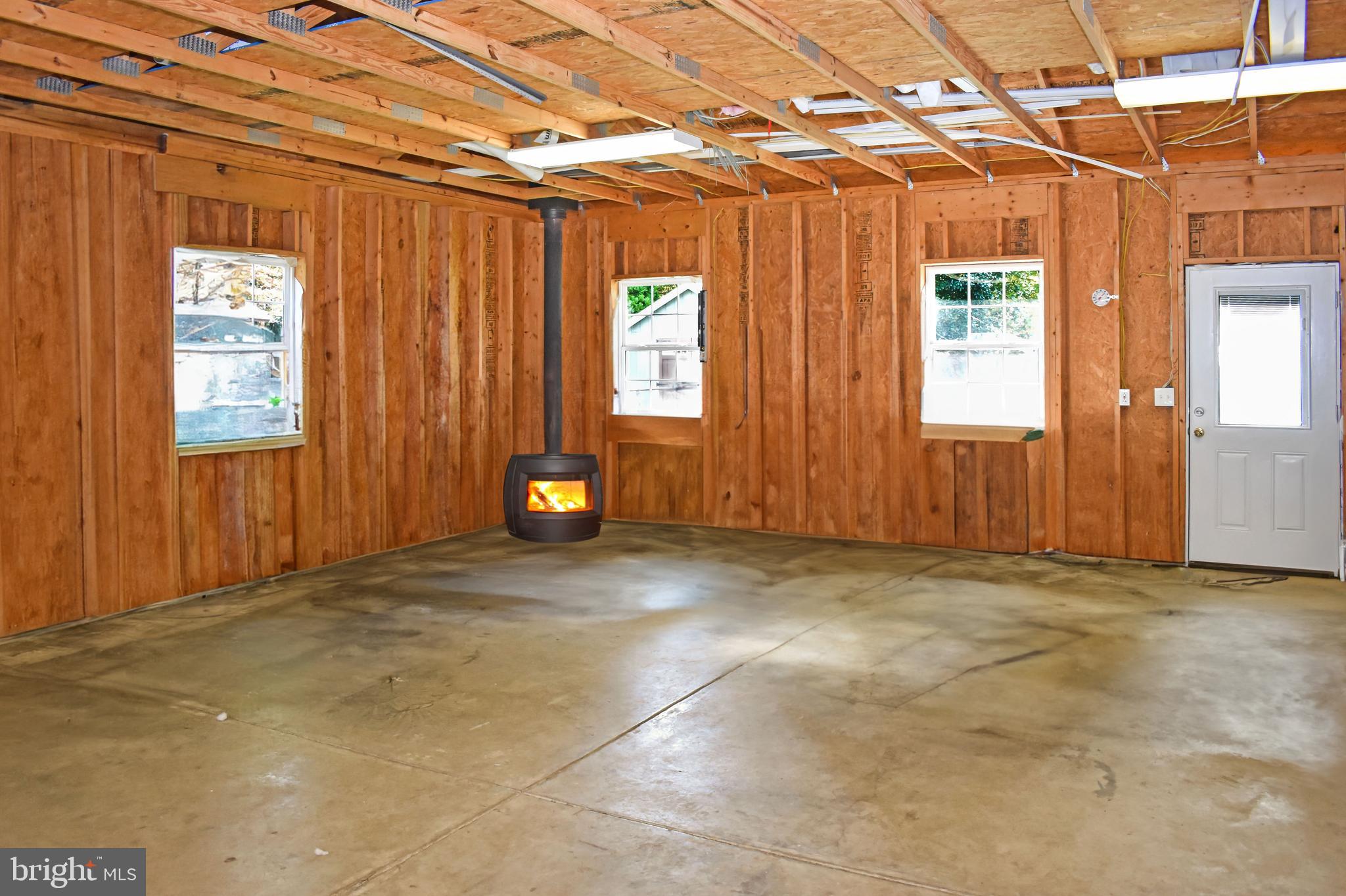 633 Burley Road Annapolis, MD 21409 - Photo 32 of 43 Huge 2-Car Garage w/ Wood Stove for Car Enthusiast
