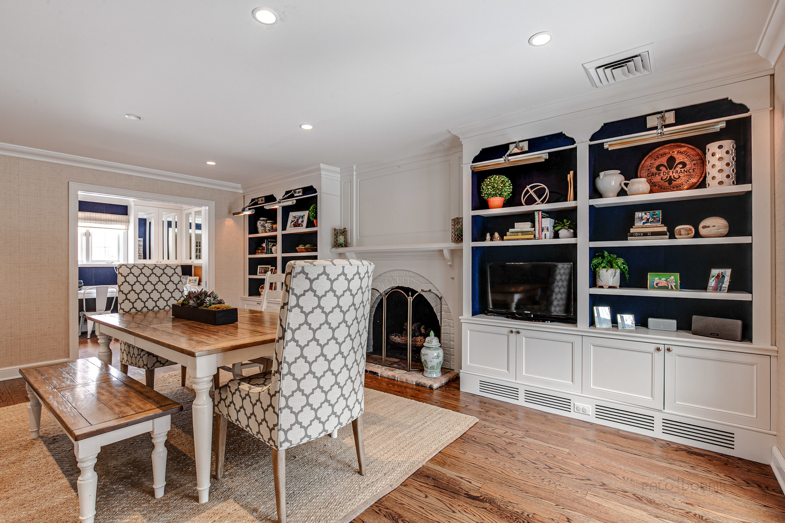 Undisclosed Address Lake Forest, IL 60045 - Photo 11 of 50 a living room with furniture cabinets and a book shelf