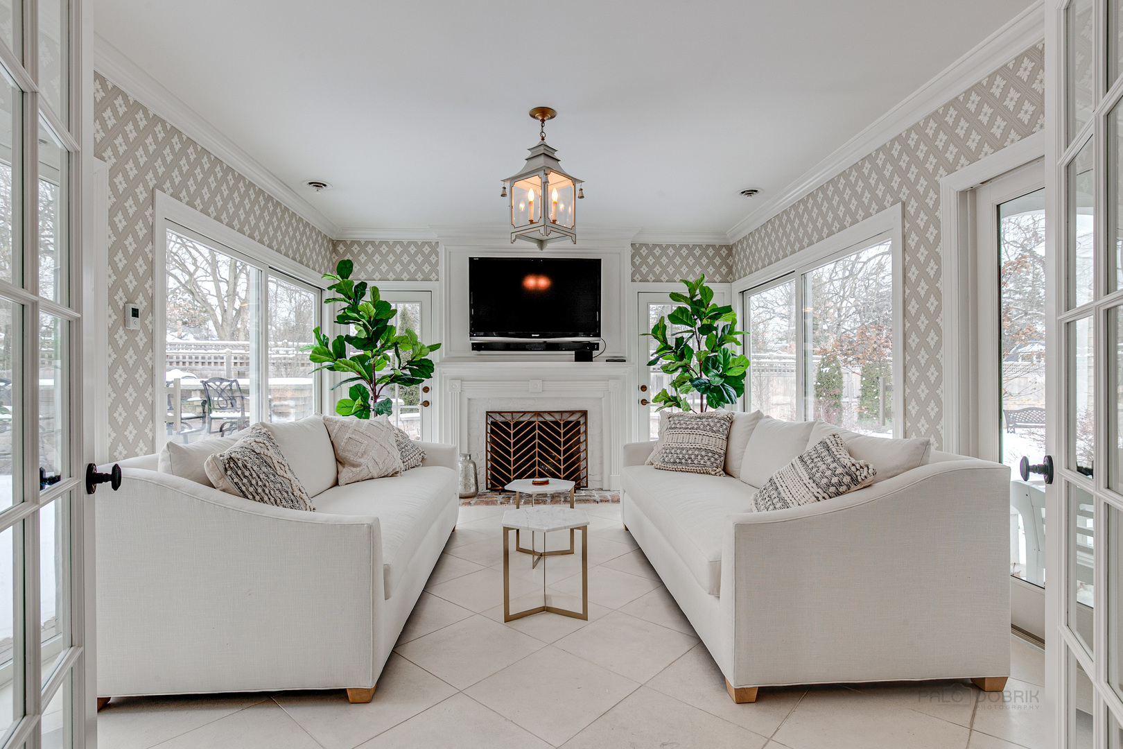 Undisclosed Address Lake Forest, IL 60045 - Photo 16 of 50 a living room with furniture a flat screen tv and a fireplace
