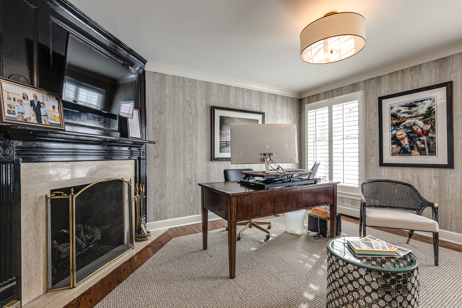 Undisclosed Address Lake Forest, IL 60045 - Photo 22 of 50 a living room with furniture a flat screen tv and a fireplace