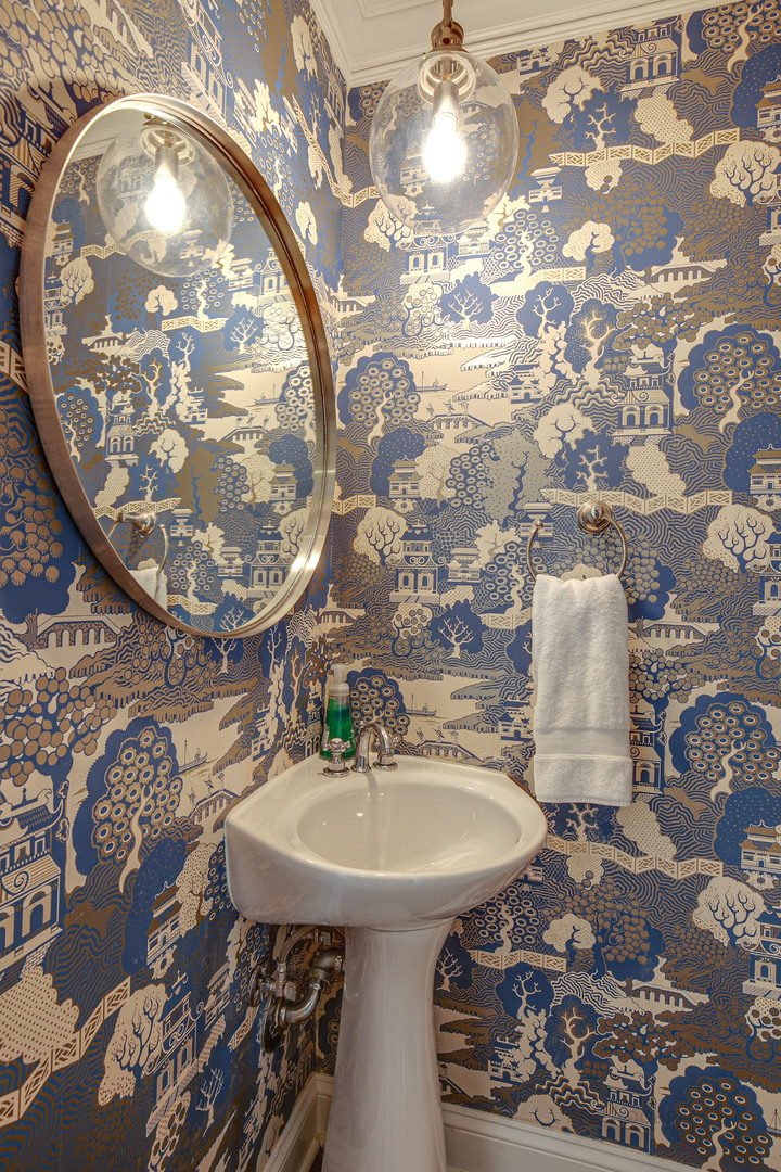 Undisclosed Address Lake Forest, IL 60045 - Photo 23 of 50 a bathroom with a sink and mirror