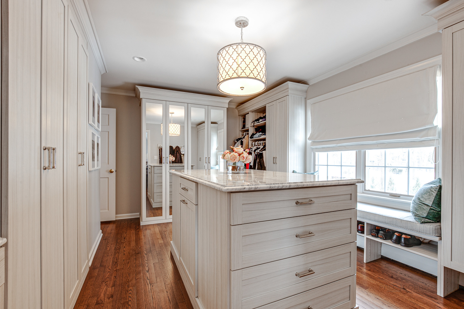 Undisclosed Address Lake Forest, IL 60045 - Photo 25 of 50 a view of a hallway with wooden floor chandelier