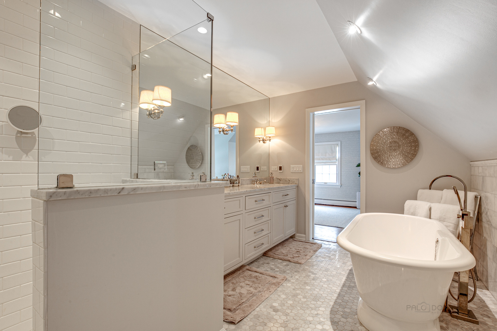 Undisclosed Address Lake Forest, IL 60045 - Photo 26 of 50 a bathroom with a sink a toilet and mirror