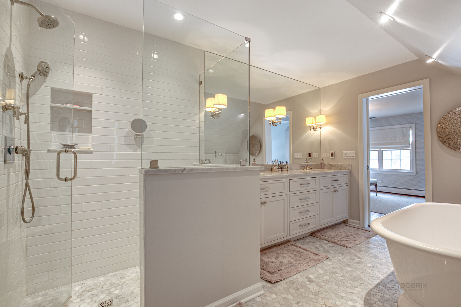 Undisclosed Address Lake Forest, IL 60045 - Photo 27 of 50 a bathroom with a granite countertop sink a large mirror and a shower