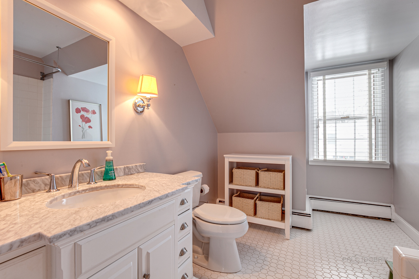 Undisclosed Address Lake Forest, IL 60045 - Photo 29 of 50 a bathroom with a granite countertop toilet sink and mirror