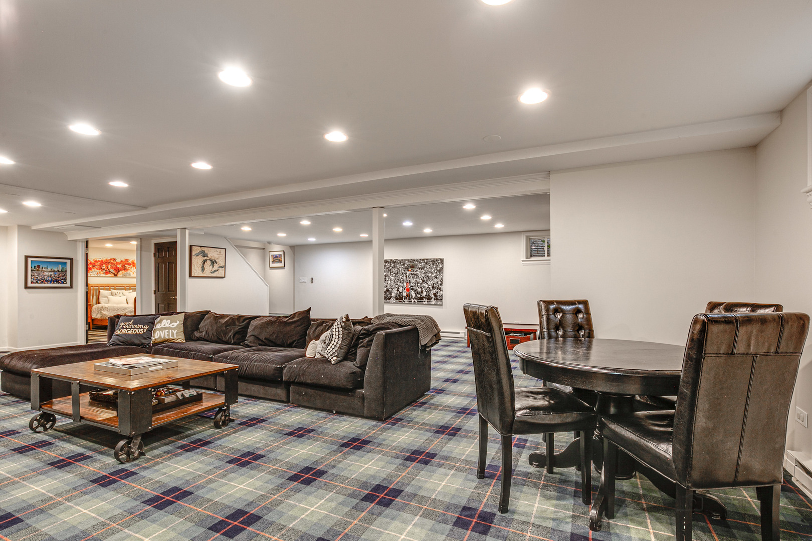 Undisclosed Address Lake Forest, IL 60045 - Photo 36 of 50 a living room with furniture a table and a flat screen tv