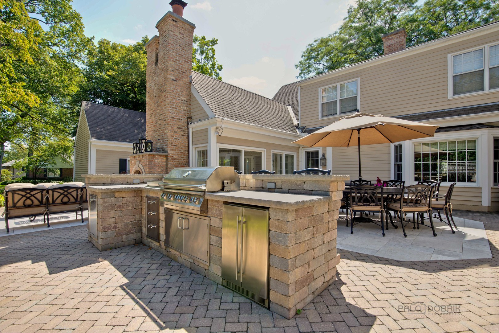 Undisclosed Address Lake Forest, IL 60045 - Photo 41 of 50 a view of a patio with table and chairs under an umbrella