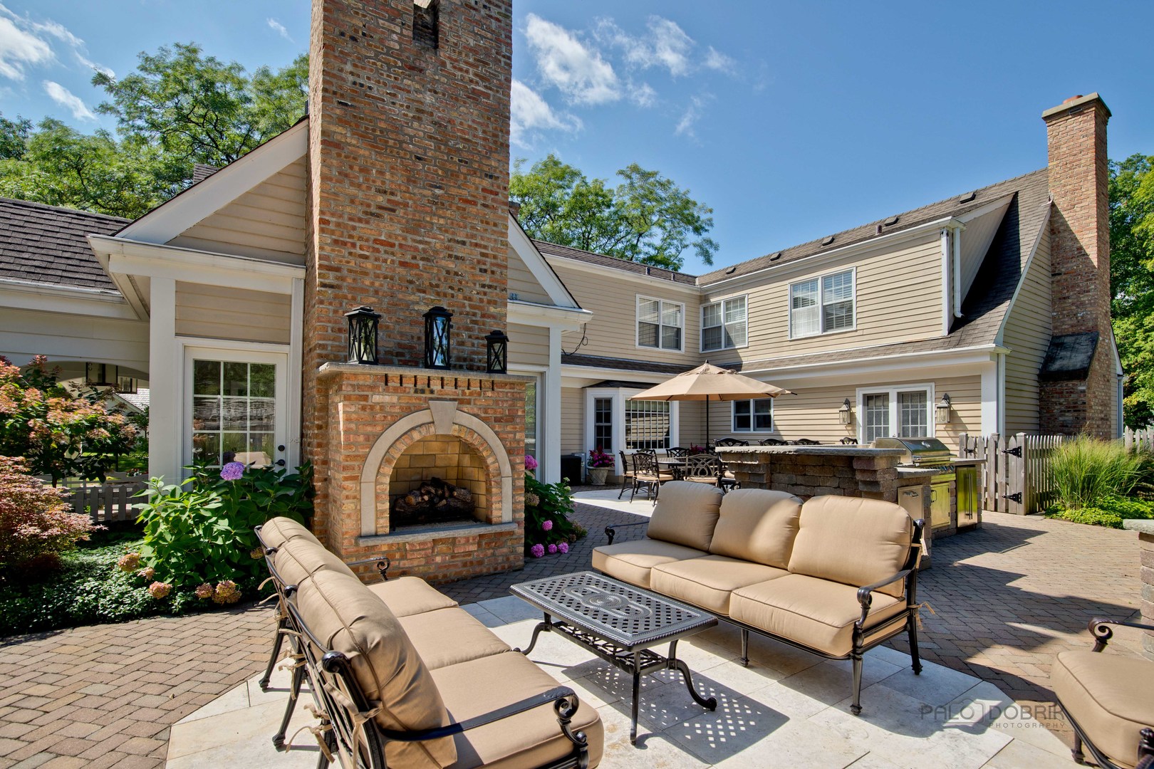 Undisclosed Address Lake Forest, IL 60045 - Photo 42 of 50 a view of a patio with couches table and chairs with potted plants