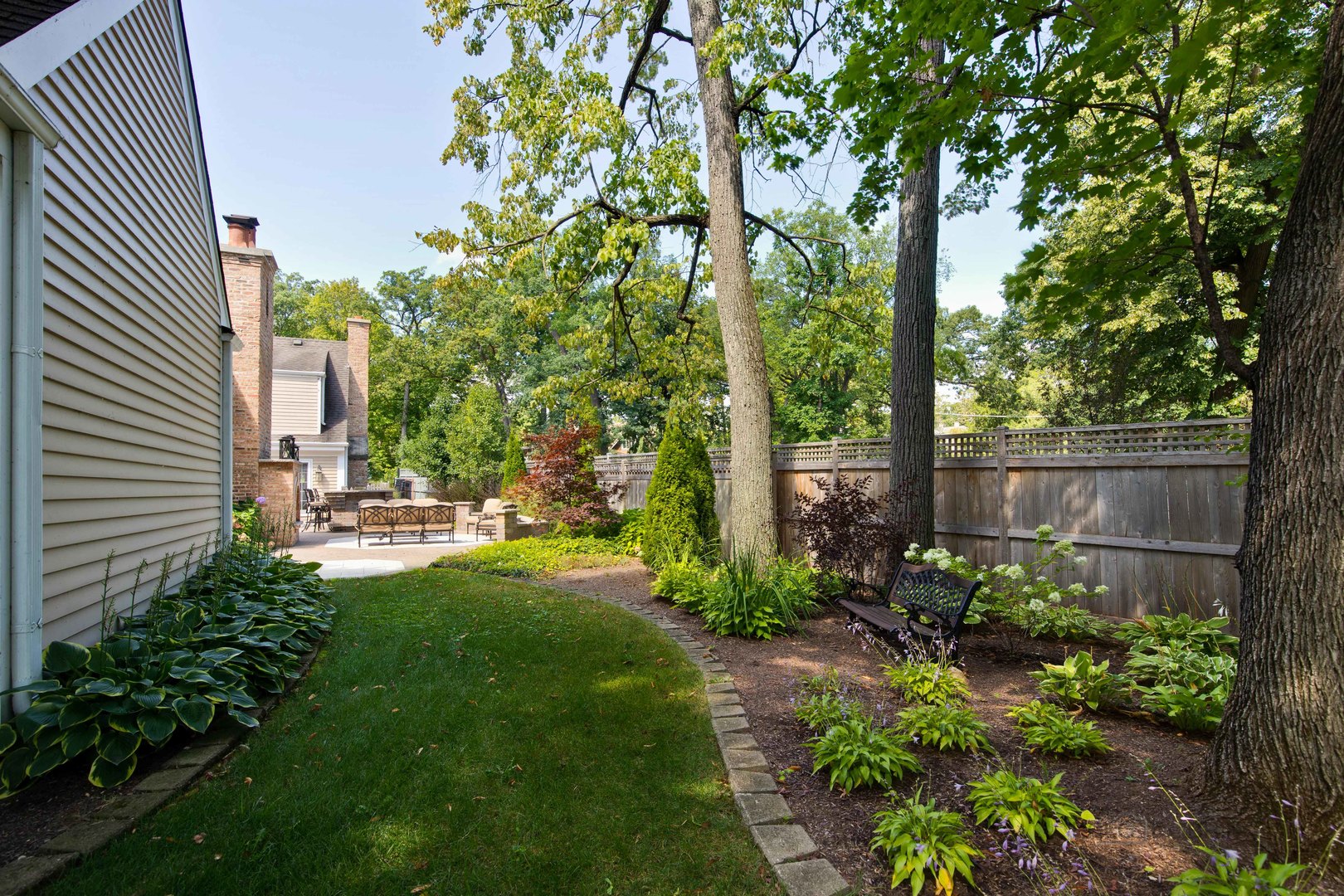 Undisclosed Address Lake Forest, IL 60045 - Photo 45 of 50 a backyard of a house with lots of green space