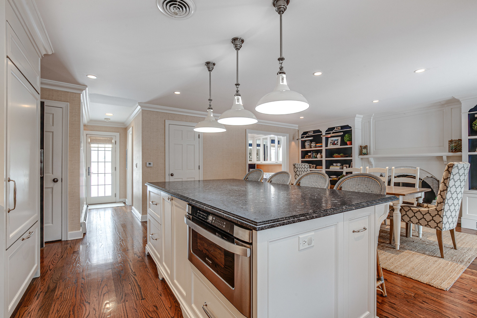 Undisclosed Address Lake Forest, IL 60045 - Photo 10 of 50 a kitchen with stainless steel appliances granite countertop a sink a stove and a wooden floors