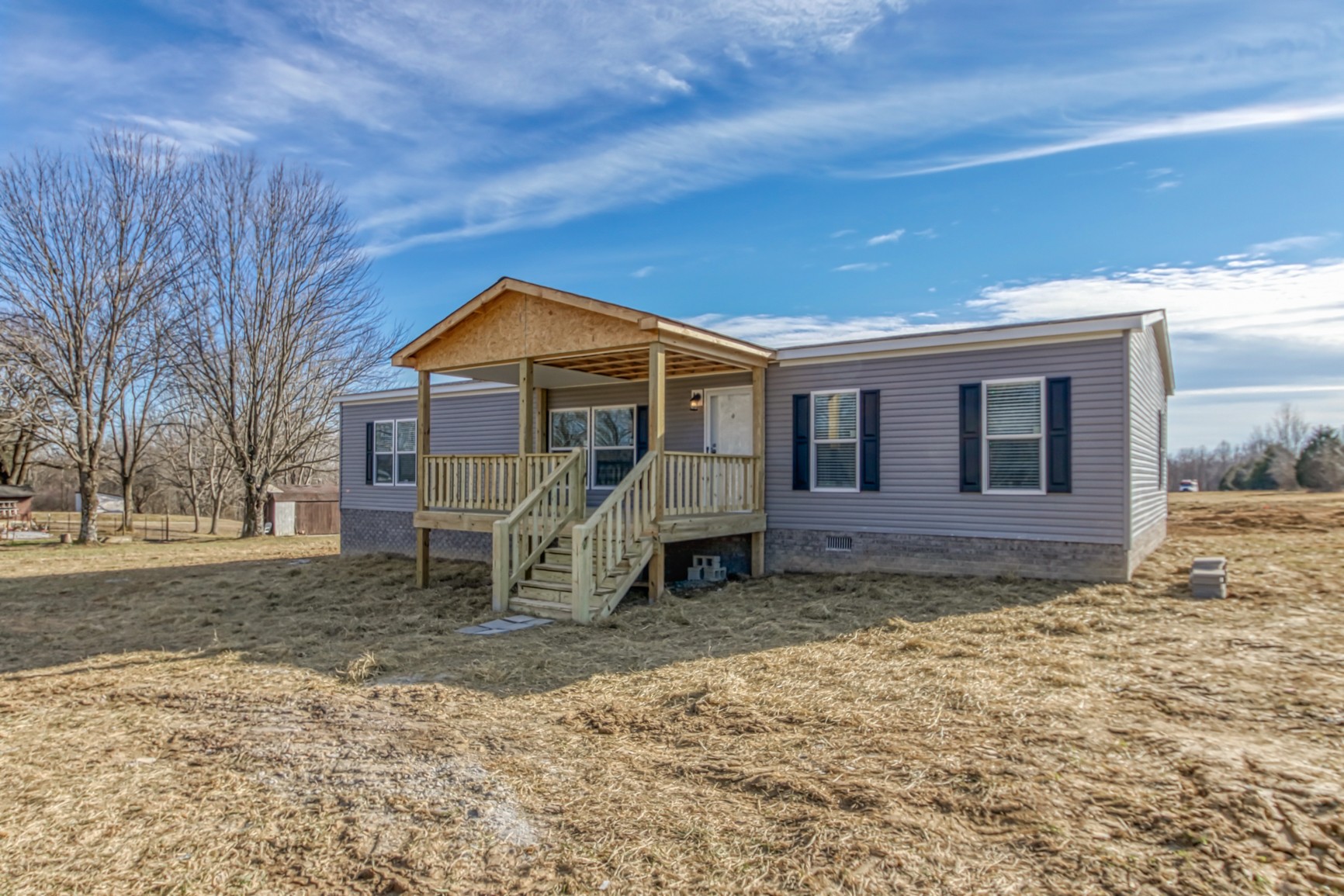 1838 Austin Road Lafayette, TN 37083 - Photo 2 of 41 a view of a house with a yard