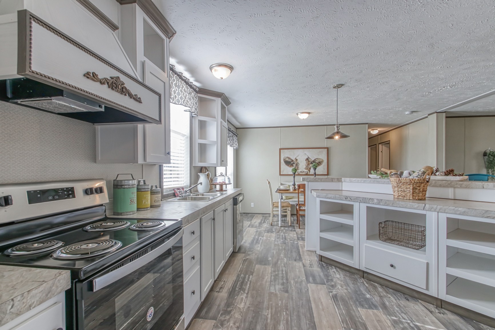 1838 Austin Road Lafayette, TN 37083 - Photo 12 of 41 a kitchen with stainless steel appliances granite countertop a stove and a sink