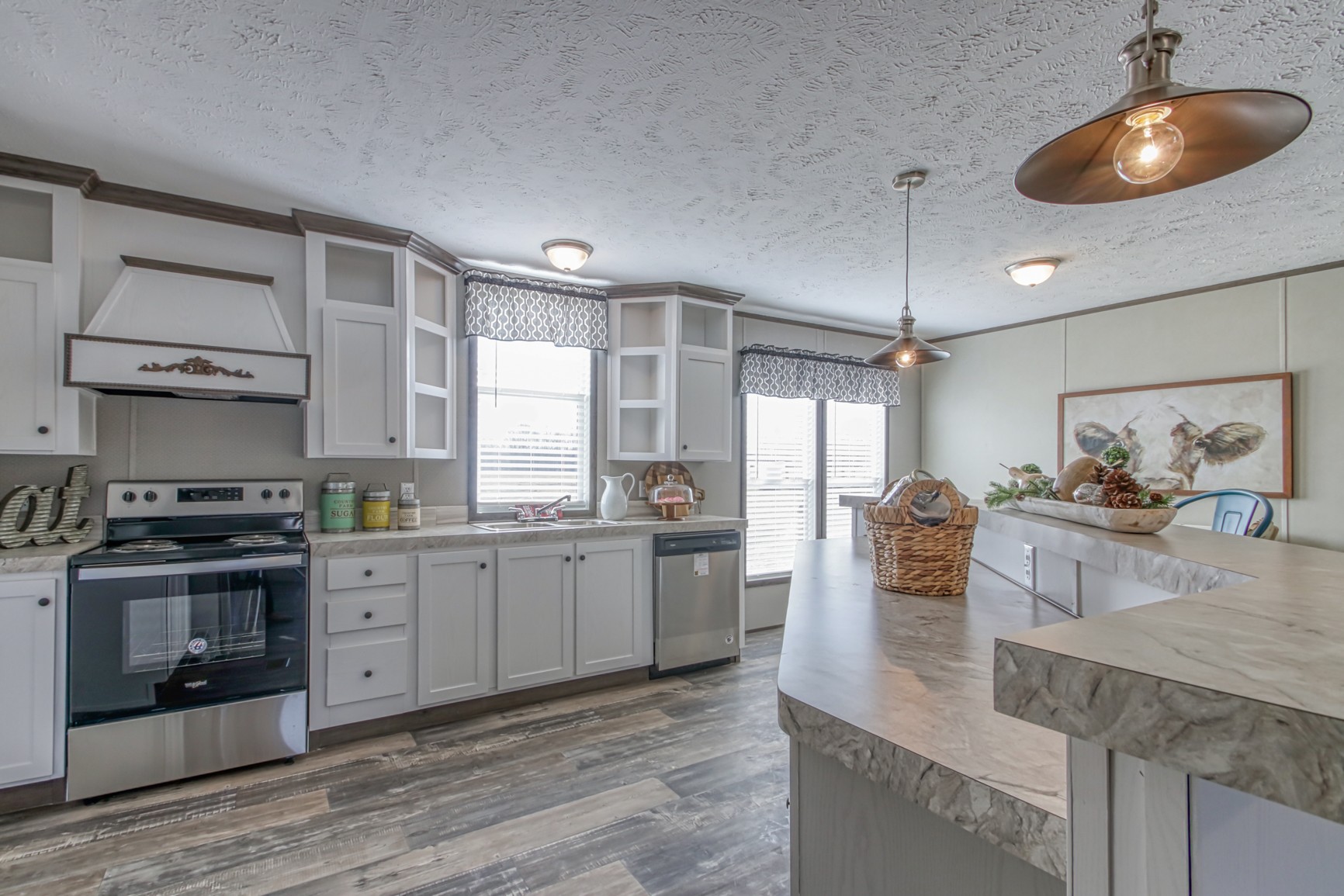 1838 Austin Road Lafayette, TN 37083 - Photo 13 of 41 a kitchen with stainless steel appliances granite countertop a stove a sink and a refrigerator