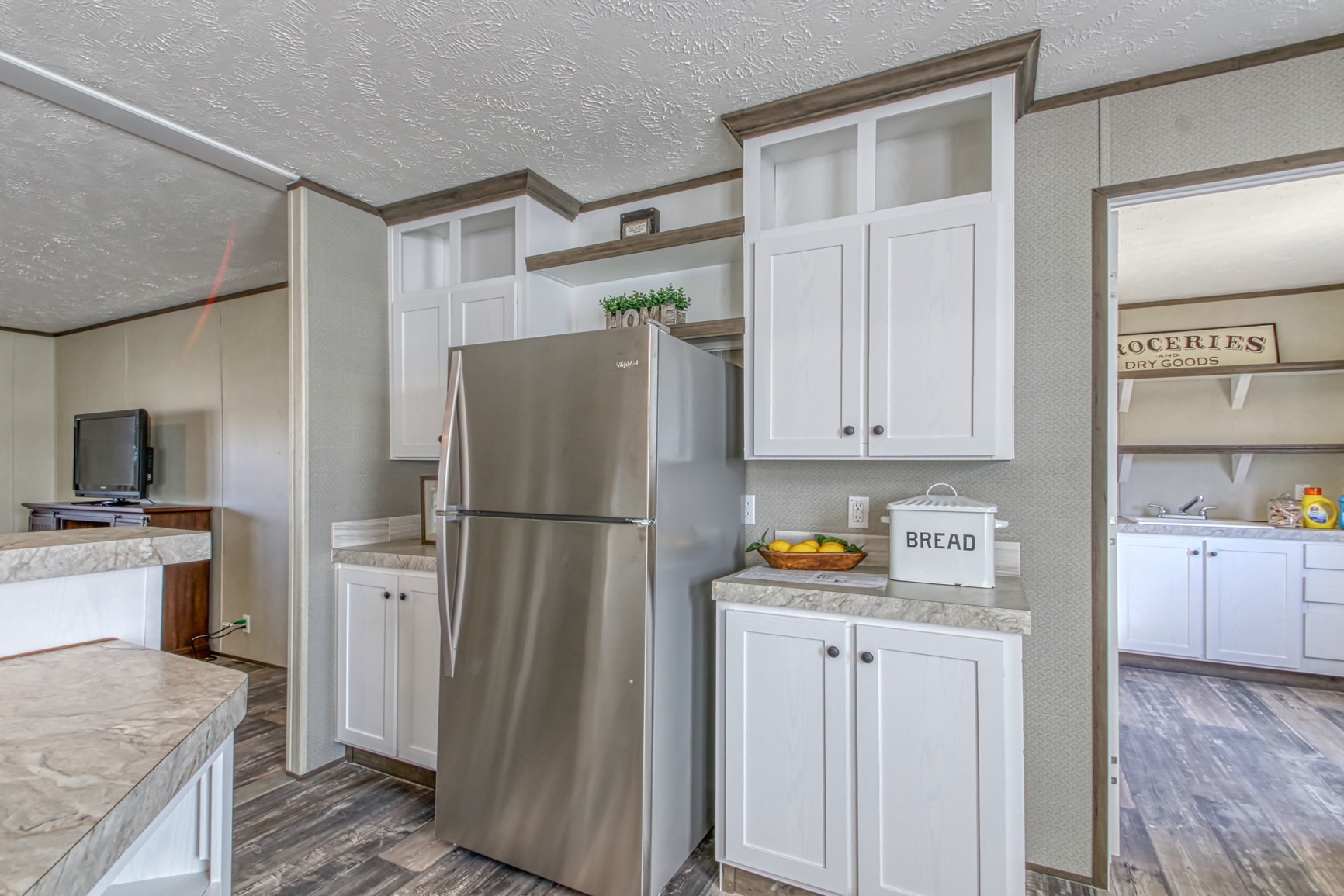 1838 Austin Road Lafayette, TN 37083 - Photo 14 of 41 a kitchen with stainless steel appliances a refrigerator sink and cabinets