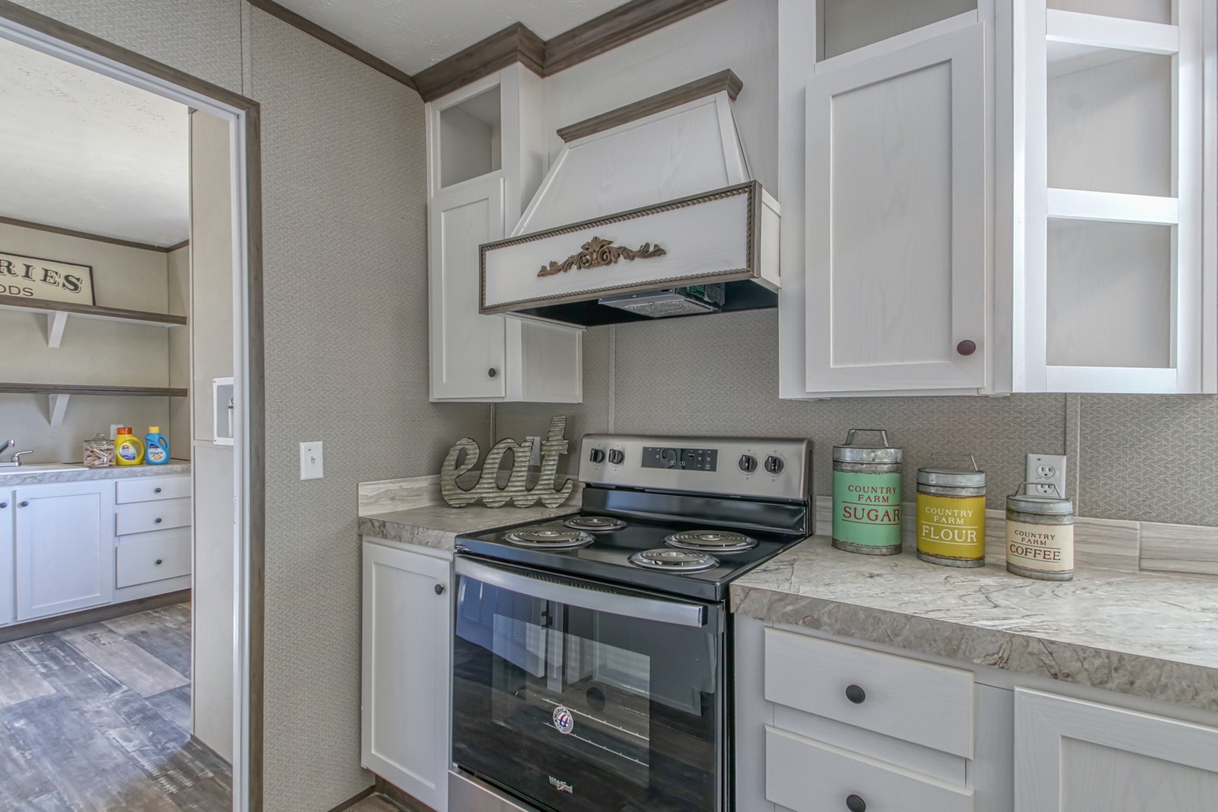 1838 Austin Road Lafayette, TN 37083 - Photo 15 of 41 a kitchen with stainless steel appliances granite countertop a sink a stove and cabinets