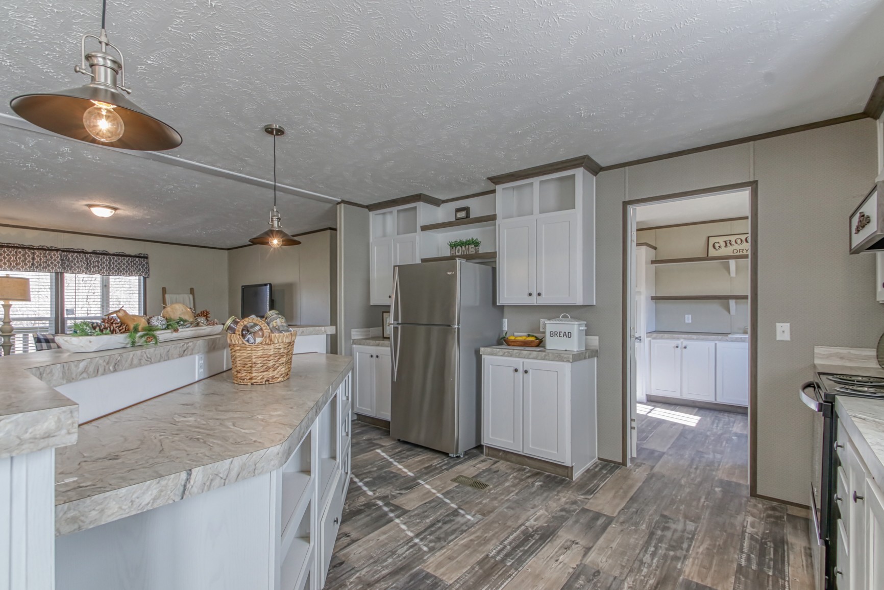 1838 Austin Road Lafayette, TN 37083 - Photo 16 of 41 a kitchen with refrigerator and cabinets